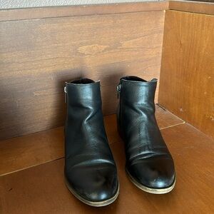 Black faux leather boots
